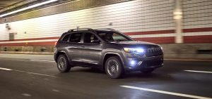 Gray 2021 Jeep Cherokee Driving in Tunnel